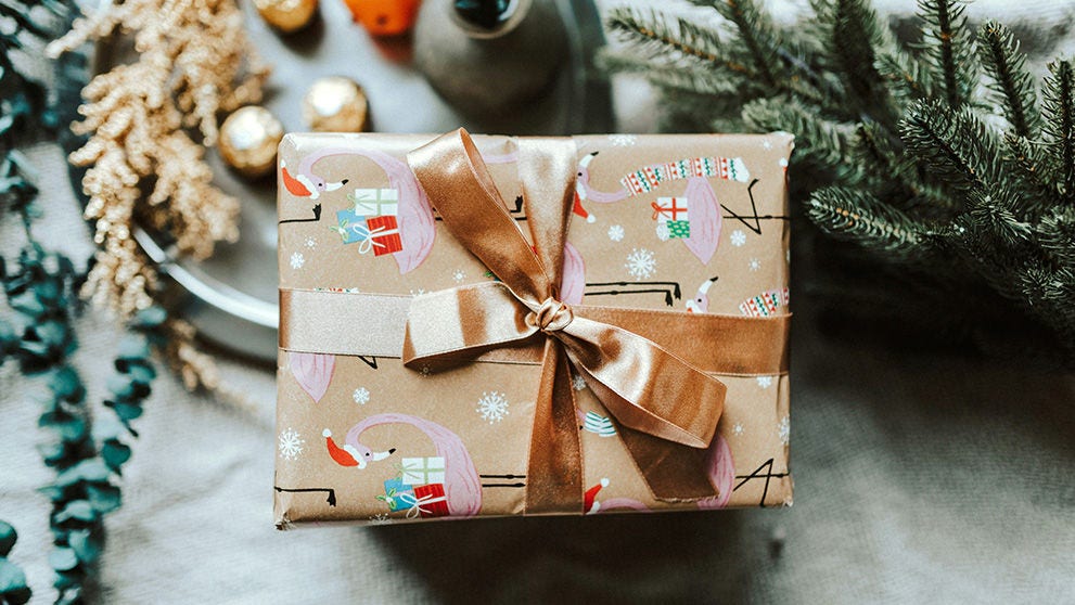 Christmas gift wrapped with a ribbon, ready for international shipping