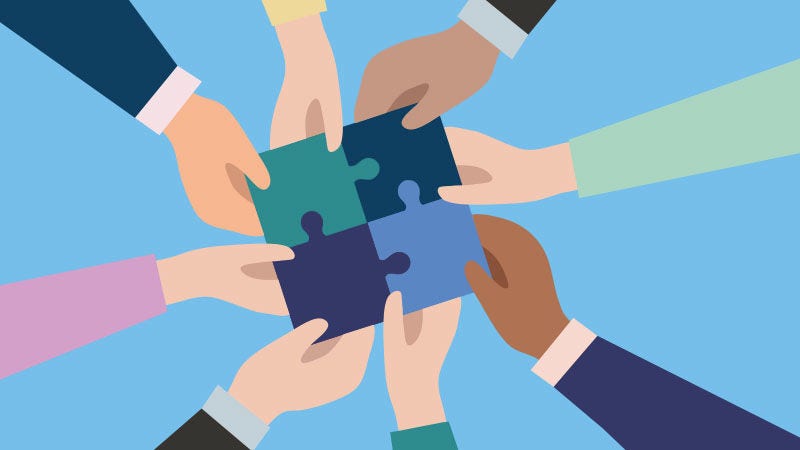 hands holding puzzle