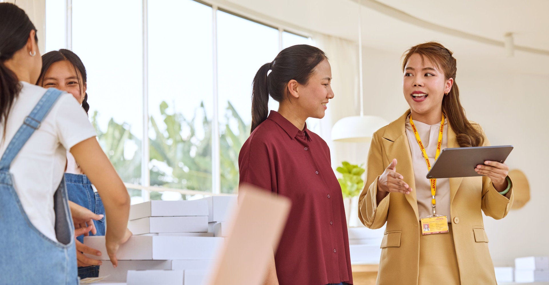 dhl staff talking to female business owner