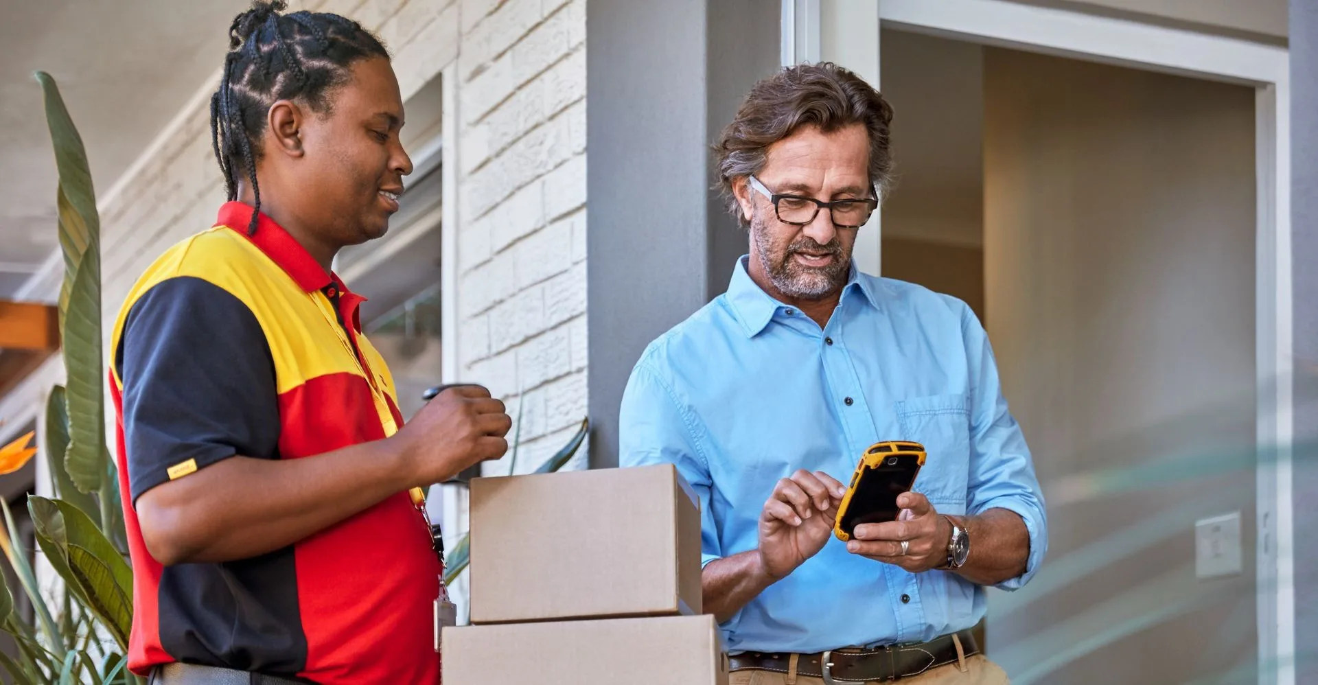 courier and customer with package showcasing international trade