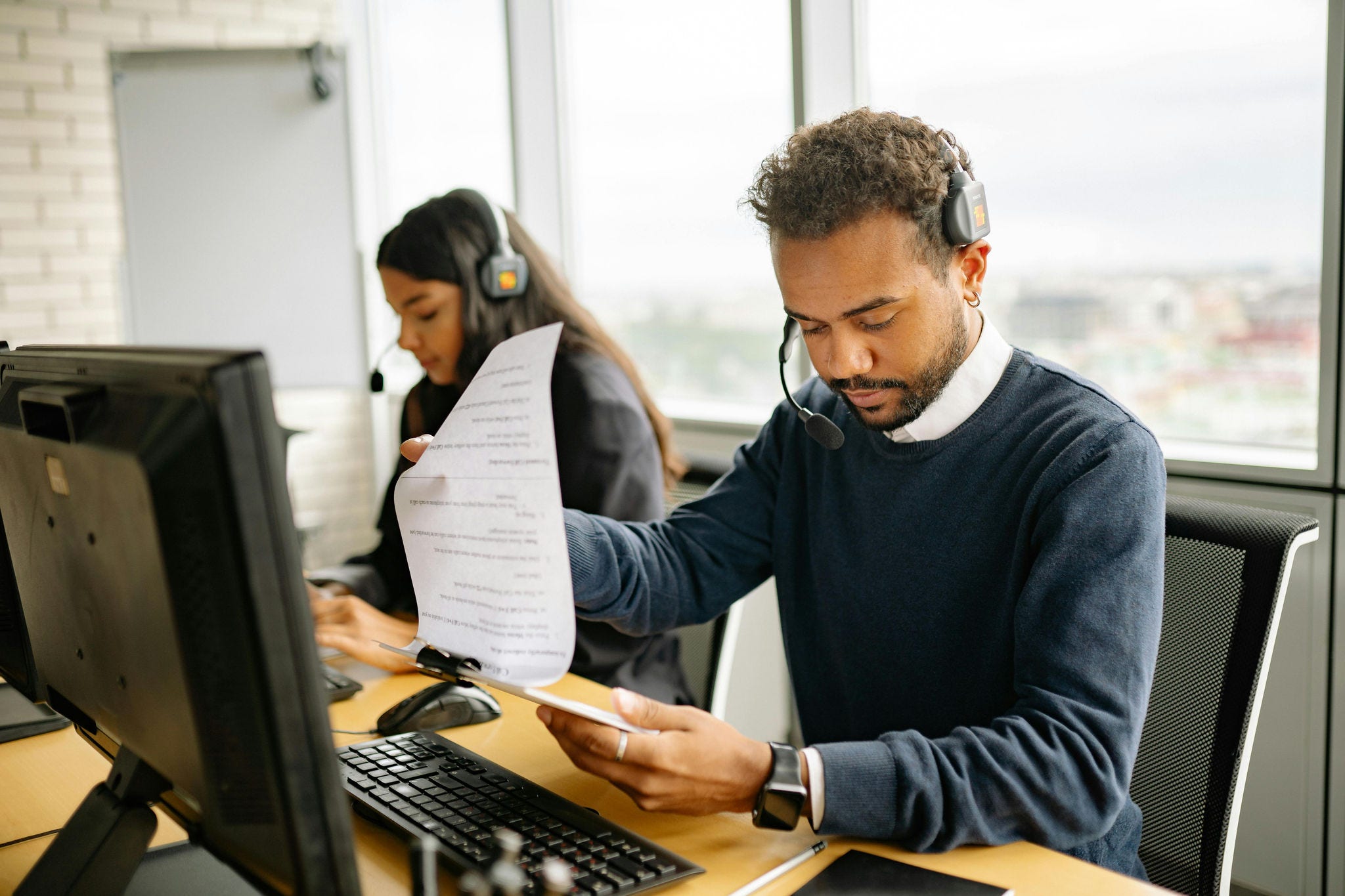 employee handles customs documents