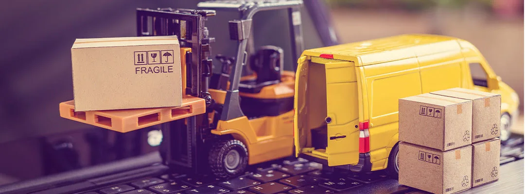 forklift, van and boxes on laptop screen