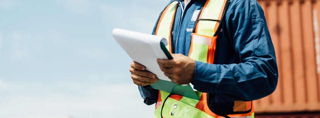 A worker working at container , Man worker managing the import and export container.