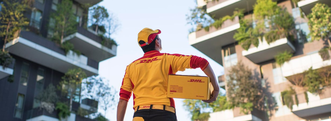 DHL Express courier holding a package