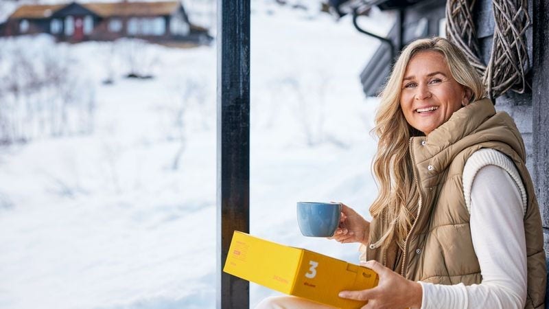 New Zealand woman holding a gift from Mother’s Day sale