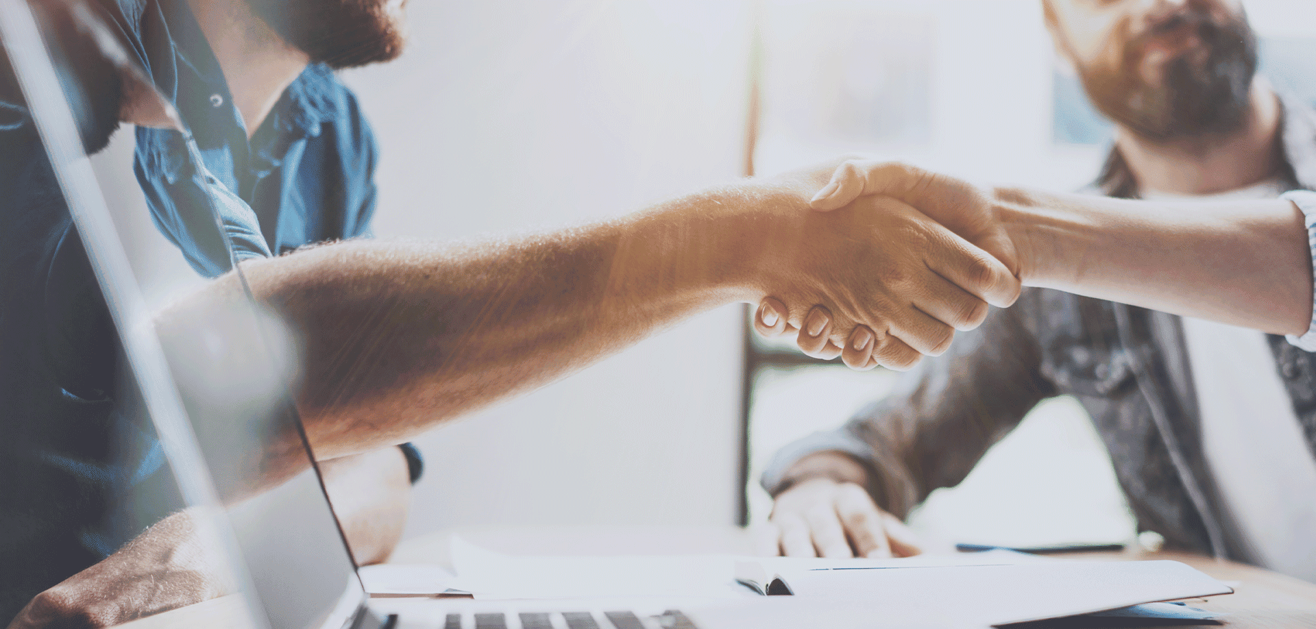 two people shaking hands