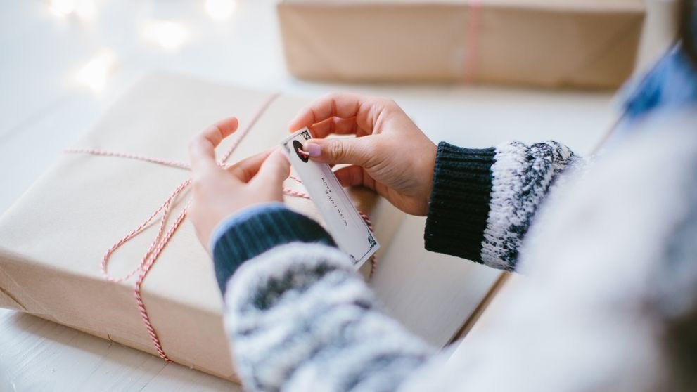 A DHL courier confidently carries a branded yellow package across a modern bridge, symbolizing speed, reliability, and global logistics connectivity. The image conveys professionalism and efficient service in parcel delivery.