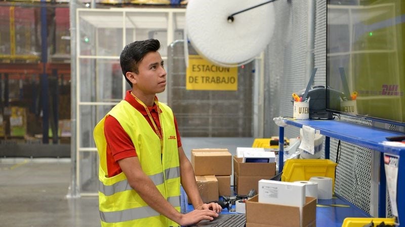 a DHL Express employee managing a facebook commerce shipment