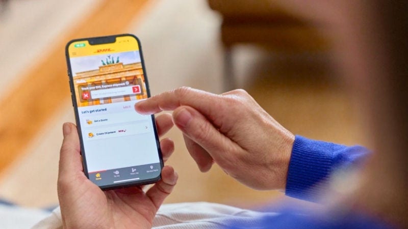 Inline Static ( 800x450)  - Close up of a female customer tracking her shipment on her smartphone.