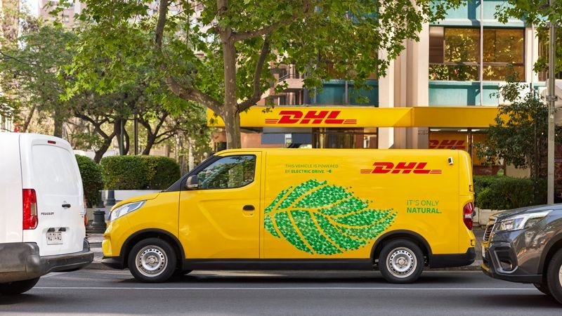 dhl express gogreen van parked at side of road