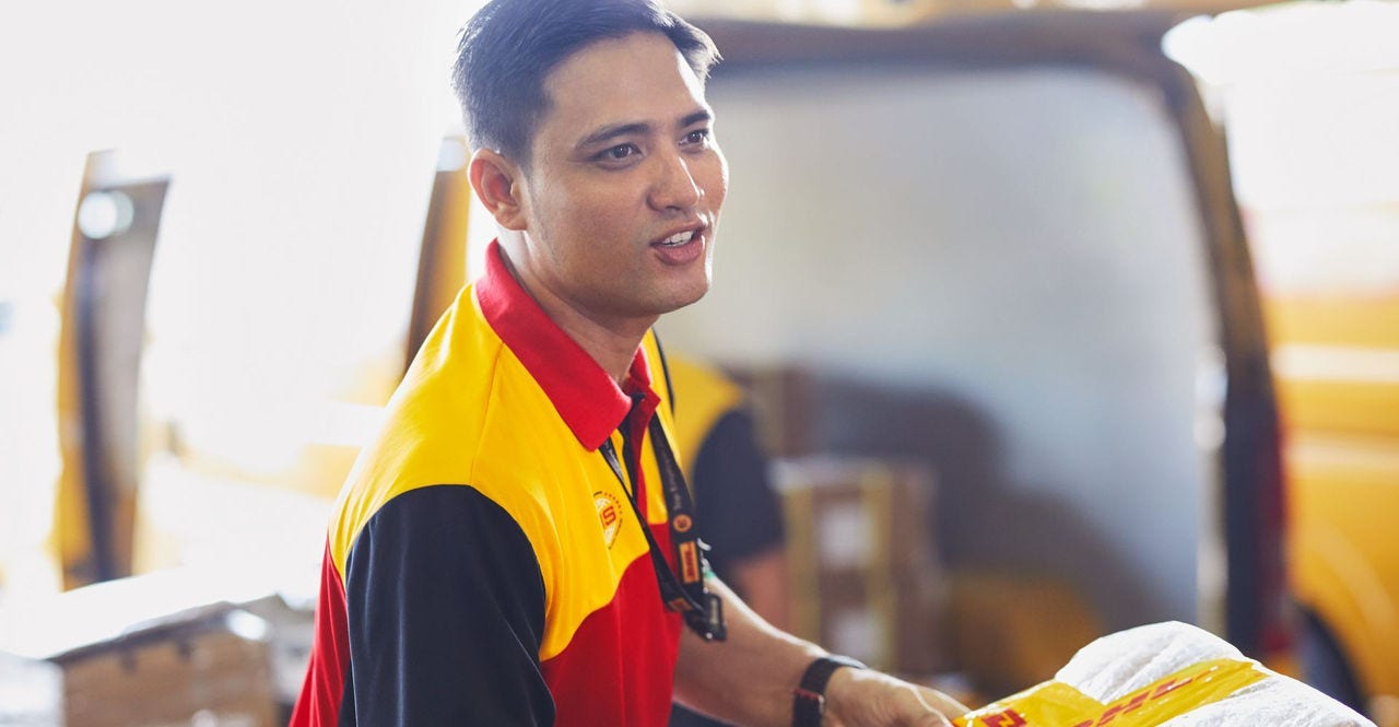dhl express handling shipping of boxes in secure packaging for overseas shipping