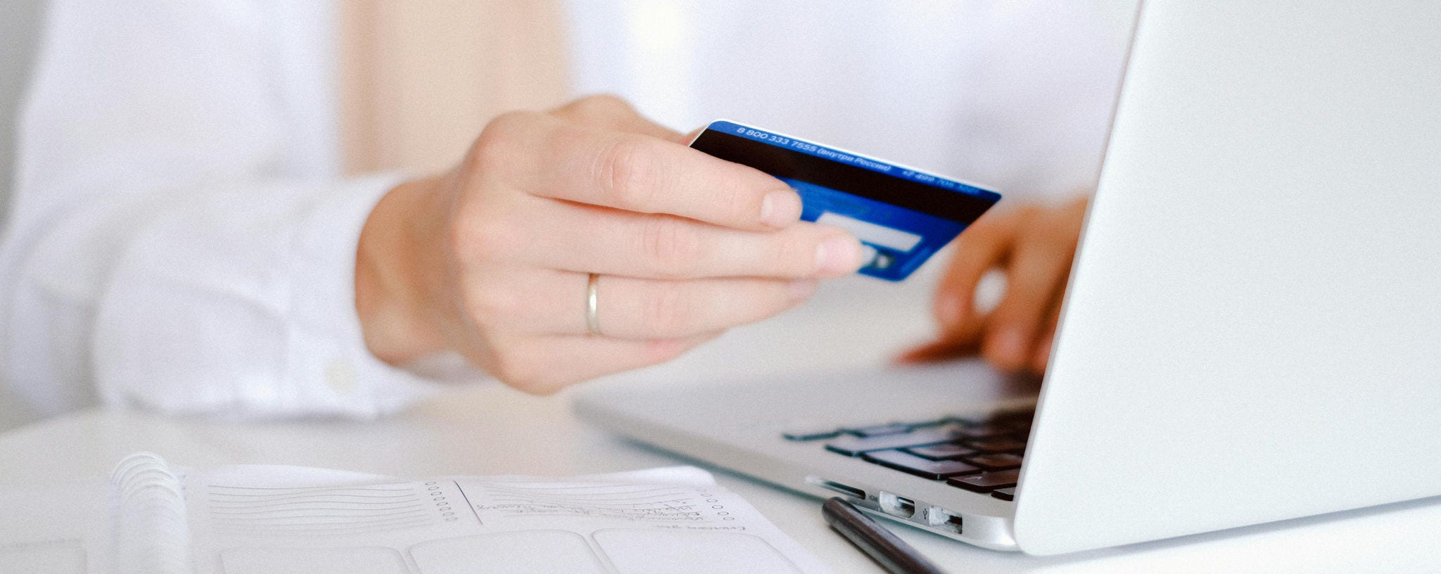 A person making a payment on an e-commerce platform