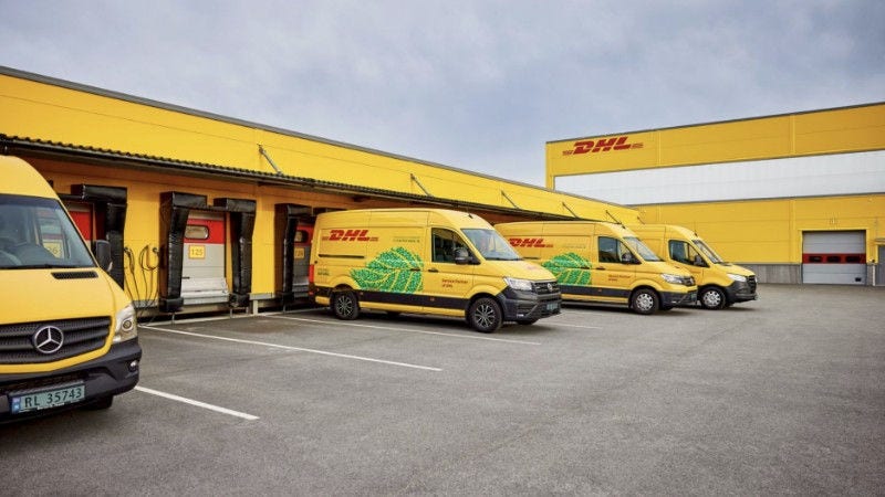 DHL vans parked and ready for delivery