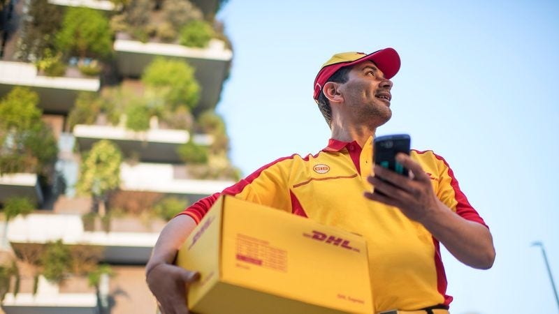 dhl staff delivering international parcel