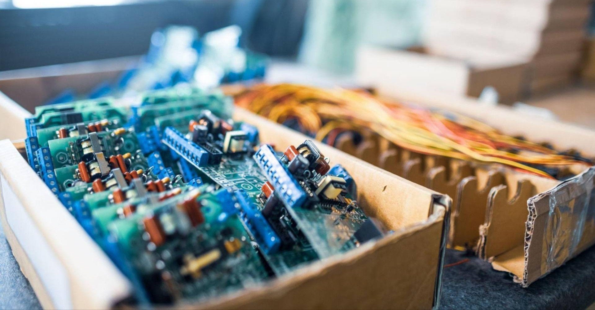 A box of electronic components packed and ready for import to India