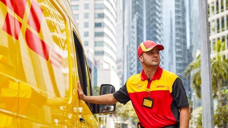 DHL Express van out for delivery in a city