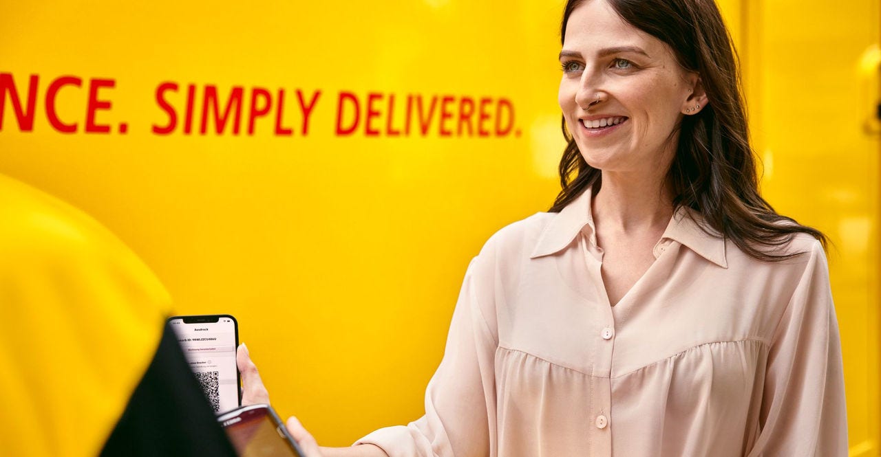 happy customer receiving an express delivery package from dhl express