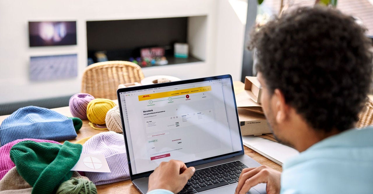 businessman from sri lanka looking at his laptop