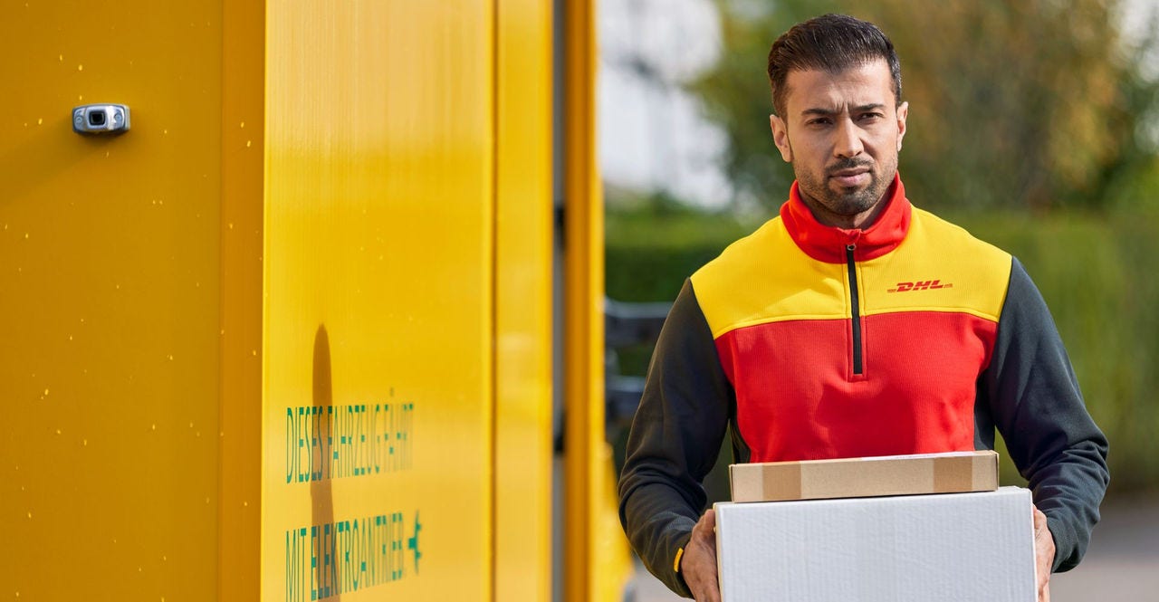 dhl employee delivering an e-commerce parcel