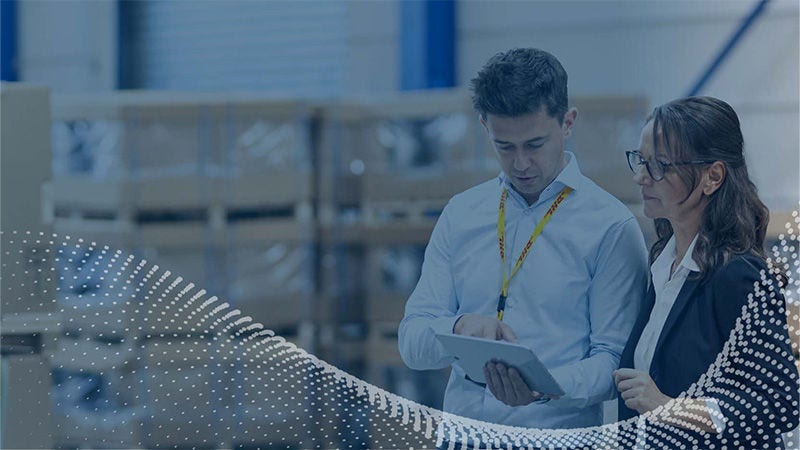 B2B guide ecommerce guide cover of a man and woman in a DHL warehouse