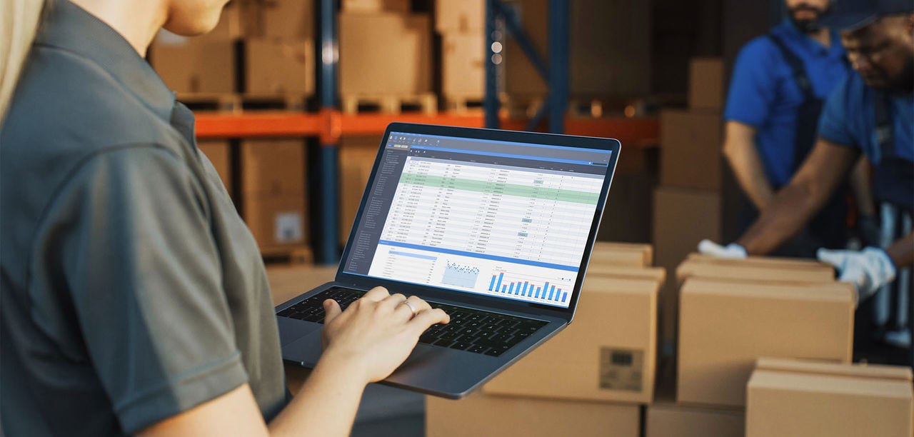 man looking at laptop screen