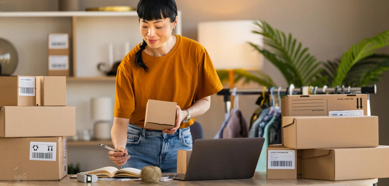woman tracking package shipments before sending them through DHL