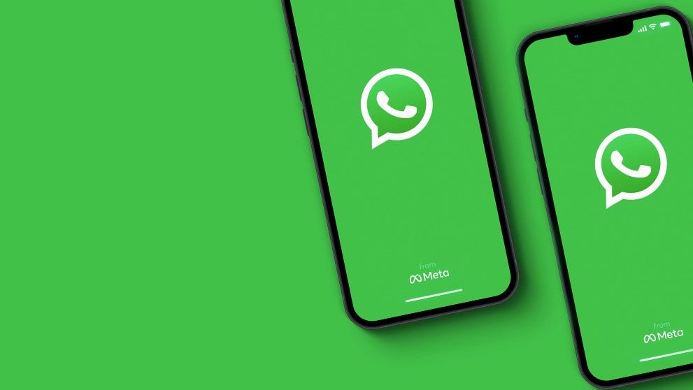 WhatsApp logo on two mobile phone screens