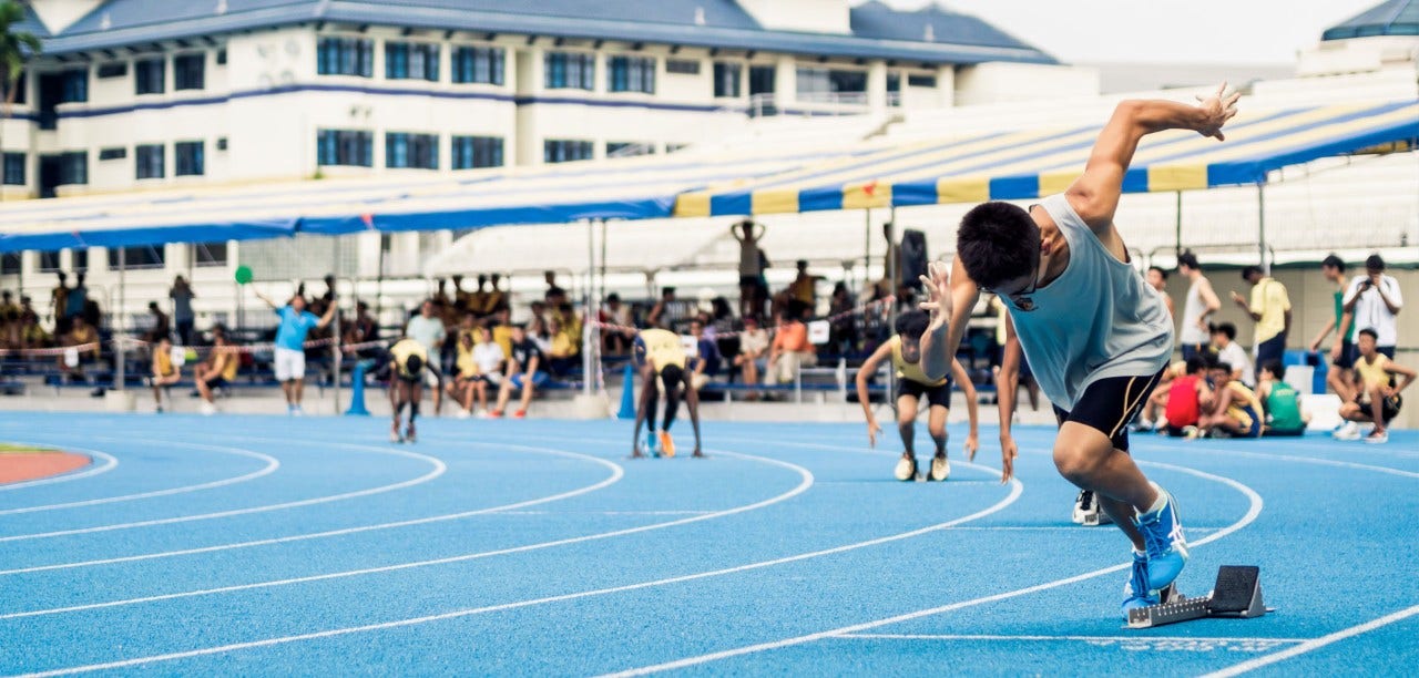 athletes on a race track