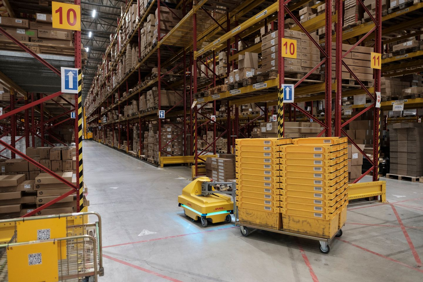 A robot transporting stocks in a DHL Express warehouse 