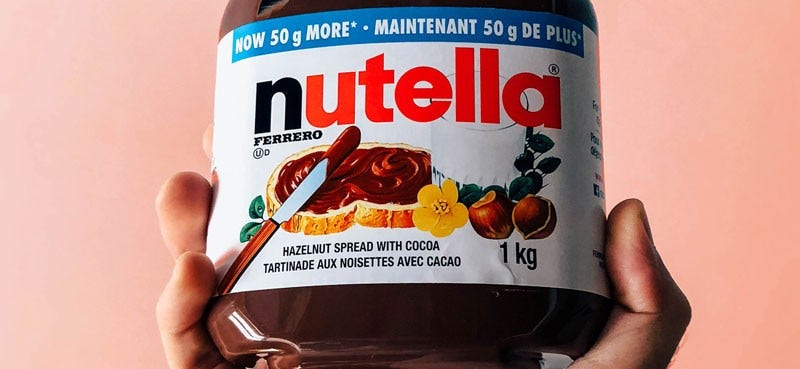 Nutella pot on a pink background