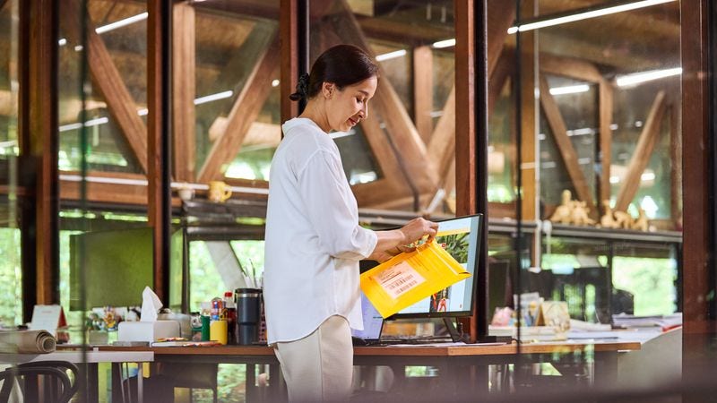 Female customer preparing shipping documents for import and export customs clearance