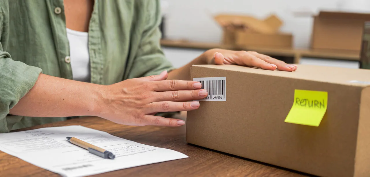 adding return label onto shipping box