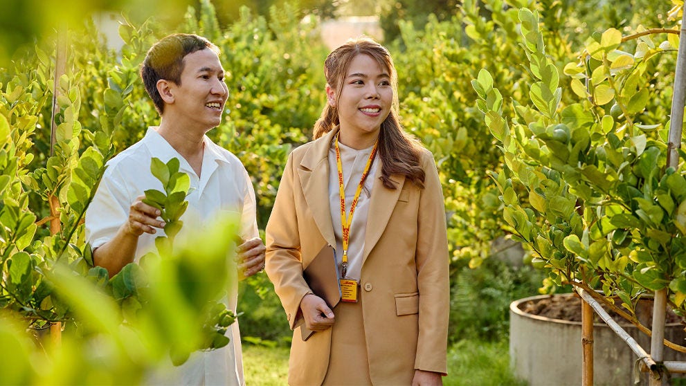 Asian man and woman in a garden