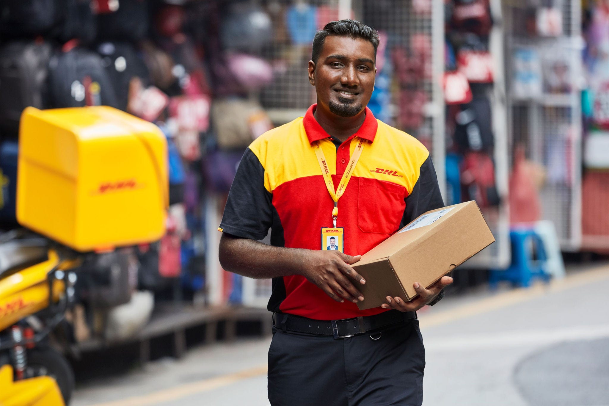 DHL scooter driver