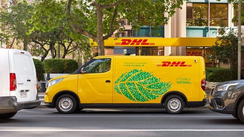 Side view of an electric DHL logistics vehicle.
