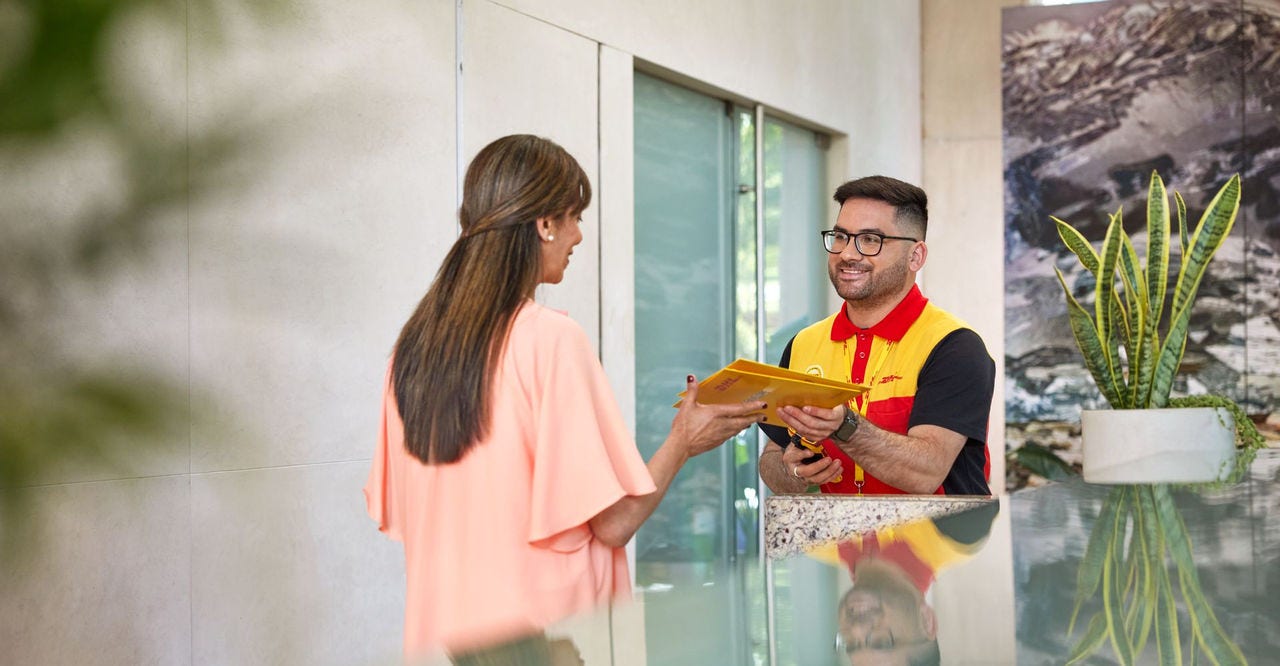  dhl express employee delivering transcripts to a university