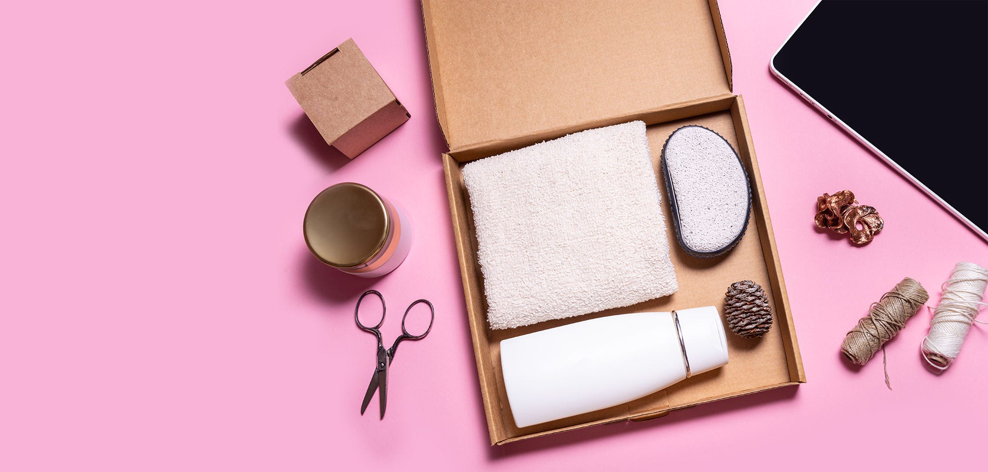 toiletries on a pink background