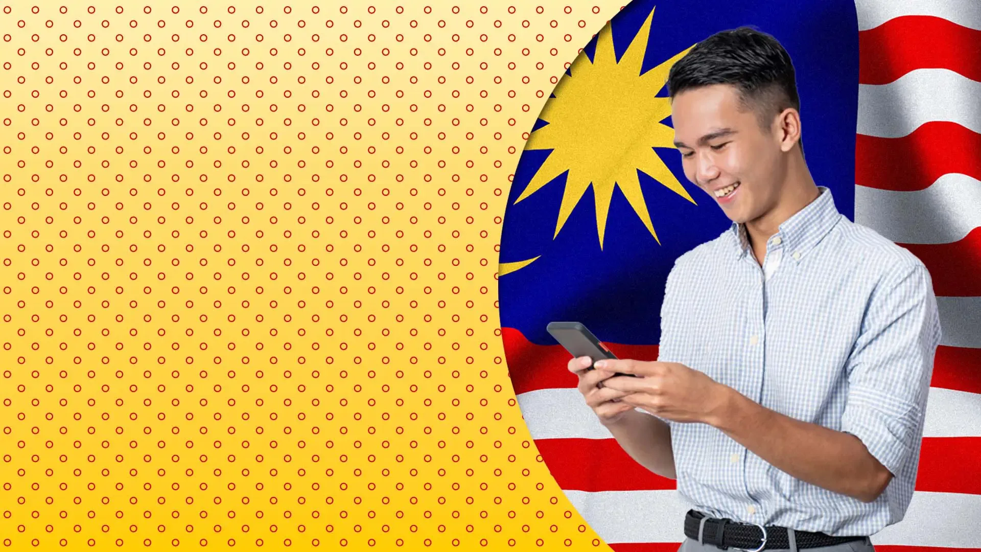 Malaysian man smiling at mobile phone screen