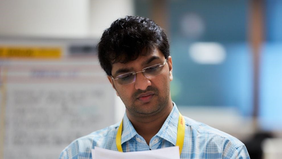 dhl express staff checking kyc documents for customs clearance