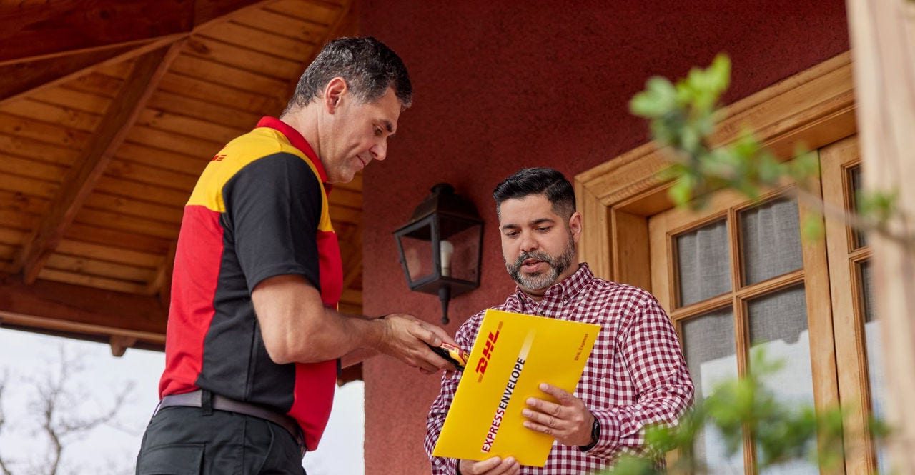 a person in pakistan receiving a dhl express envelope from china