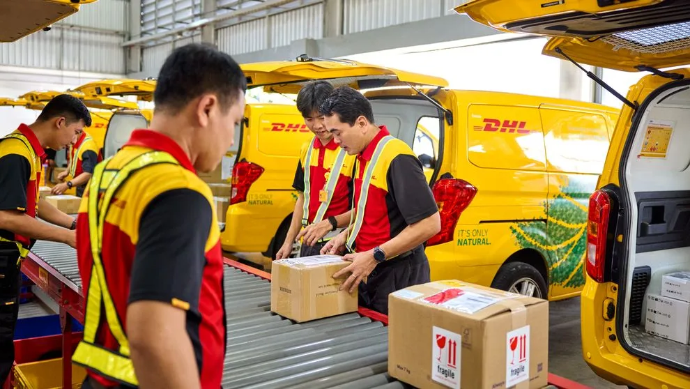 Parcels arriving at DHL Express processing centre 