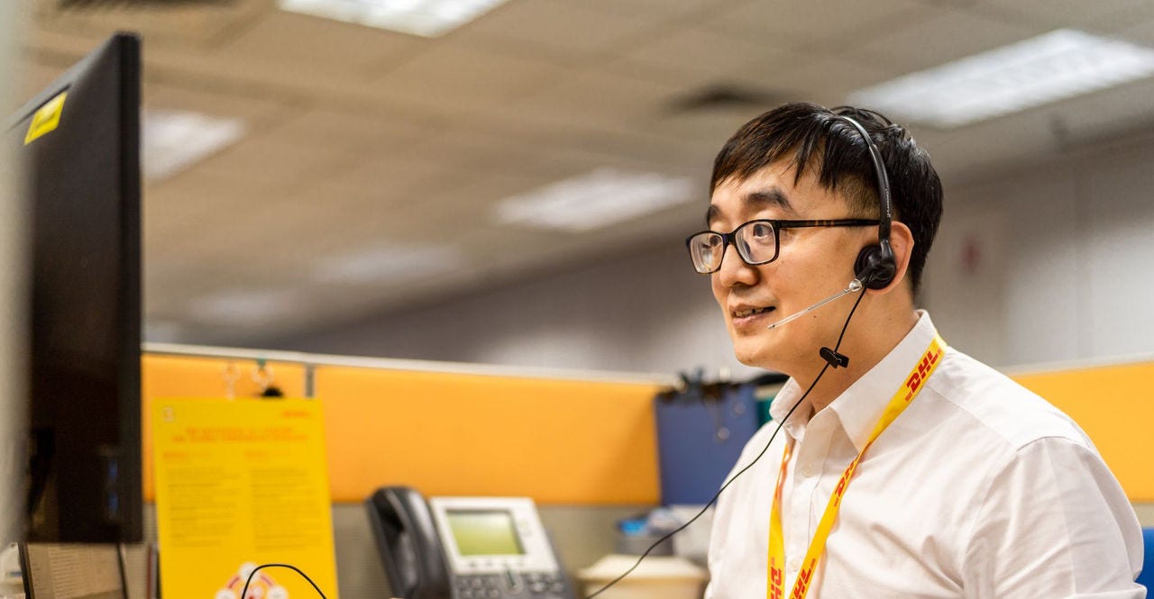 A customer service officer attending to a client