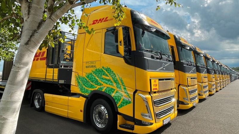 dhl express' carbon-neutral trucks contribute to sustainability in the manufacturing industry with green-logistics-transportation