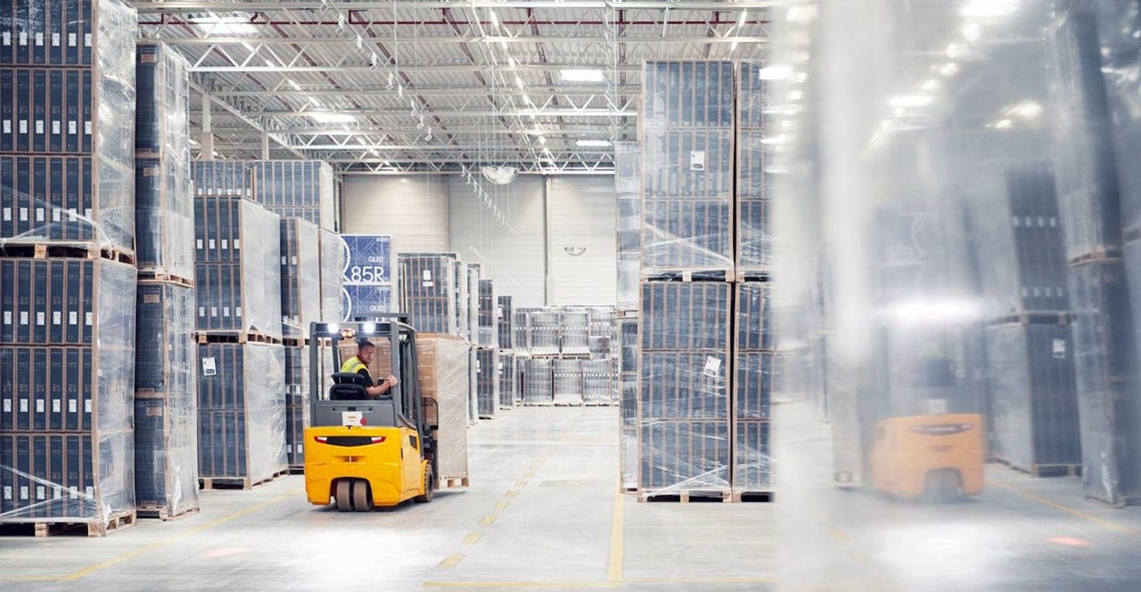 a dhl express employee working hard to ensure supply chain management