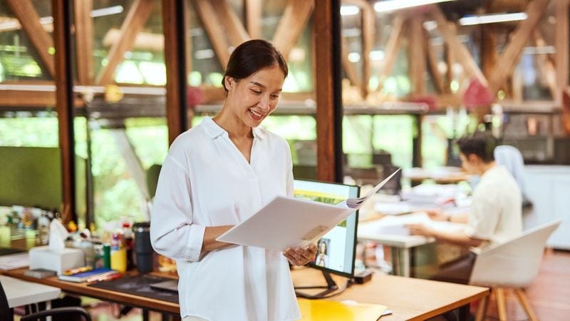 DHL Express customer looking through documents