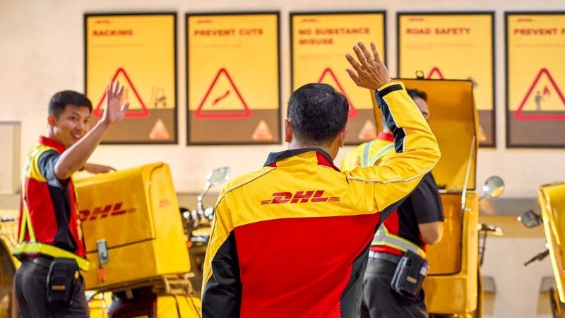 DHL Express couriers prepare to deliver to Thai recipients