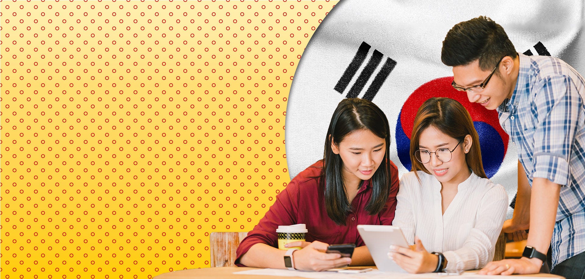 three people looking at tablet screen