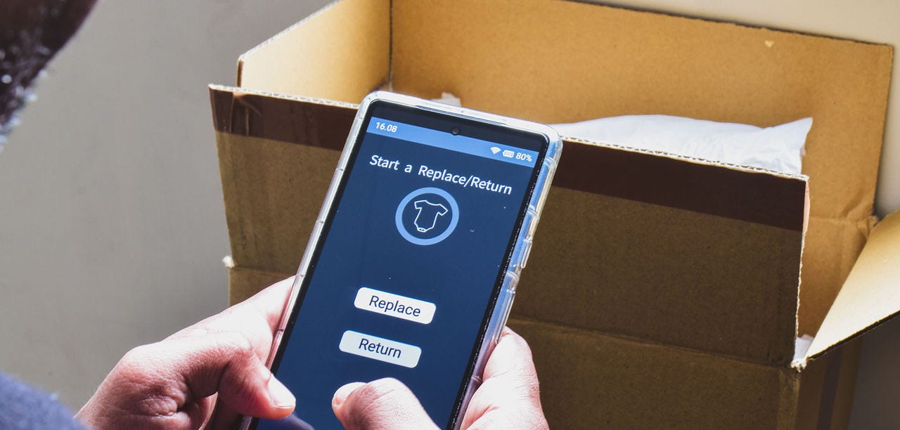 hand typing on mobile phone screen