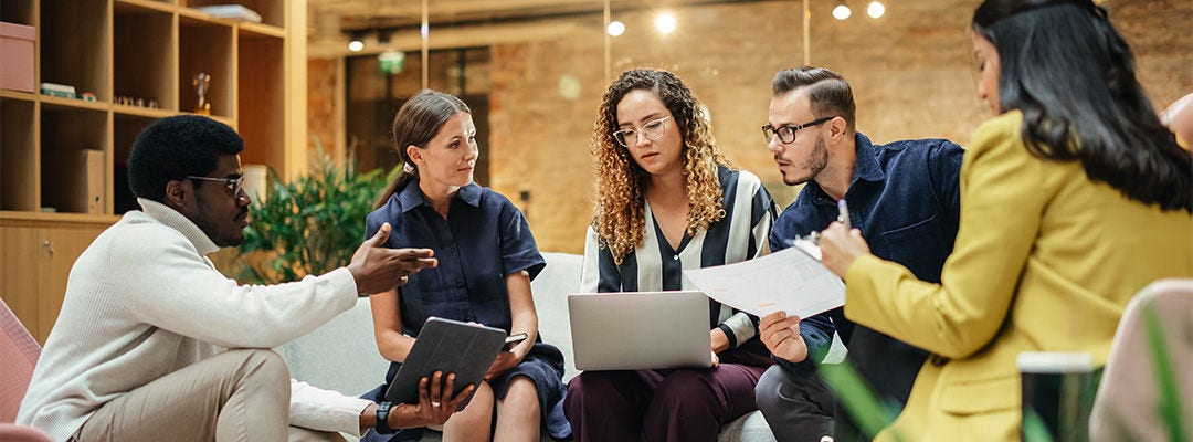 people in a group having a discussion