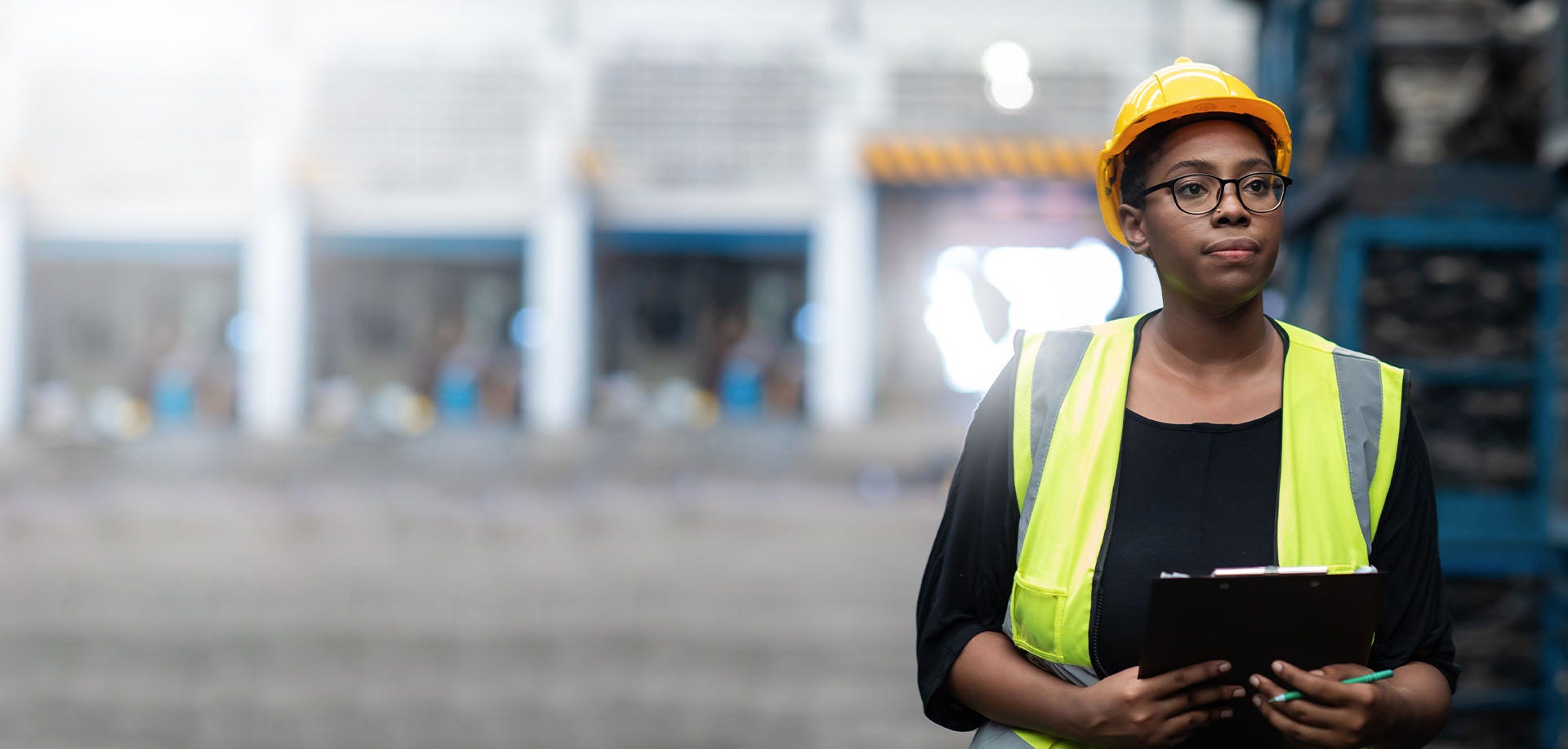 woman in a high vis and hard hat